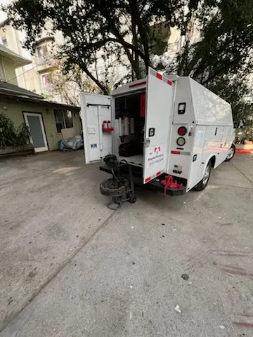 Magnet Plumbing service vehicle on-site for Grease Trap Cleaning in Loxahatchee